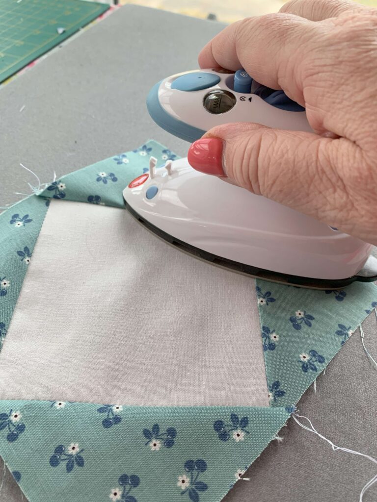 ironing a quilt block