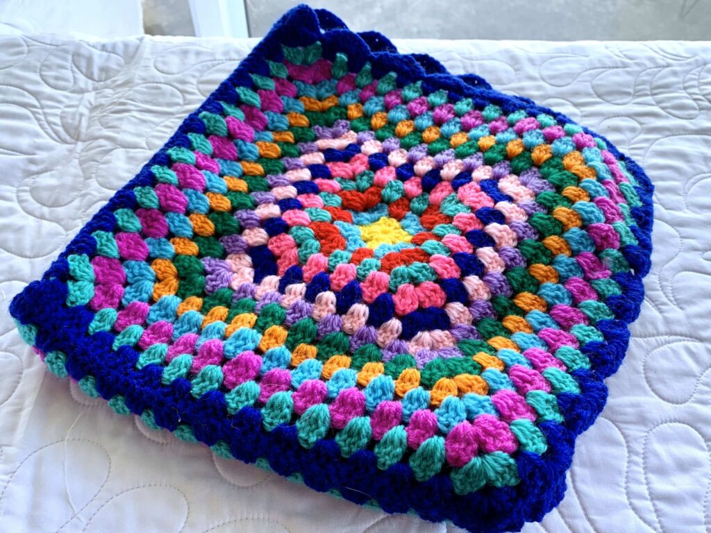 cat blanket made from large crochet squares for cat blankets for local animal shelter #cat blankets #crochet blankets #blanketsforanimalshelter #largegrannysquares #crochet #crochetgrannysquares