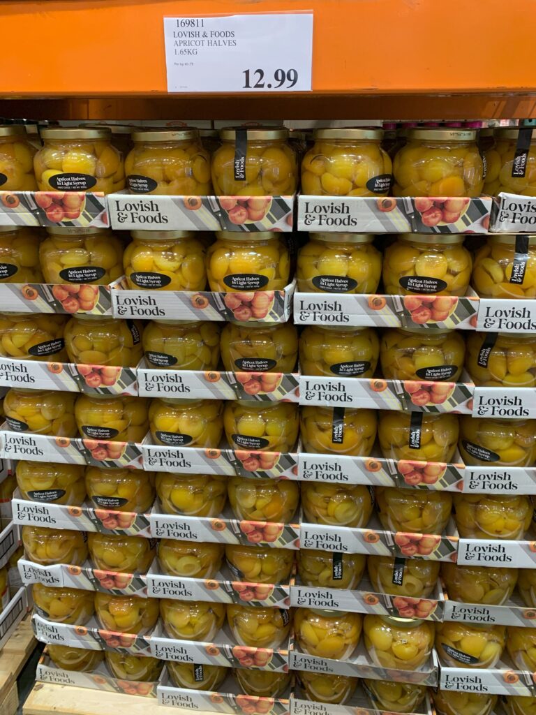 large jars of bottled apricots on a pallet at Costco in Richmond, Melbourne