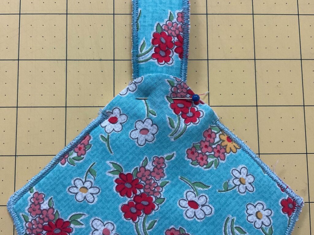 attaching handle to edge of fabric basket