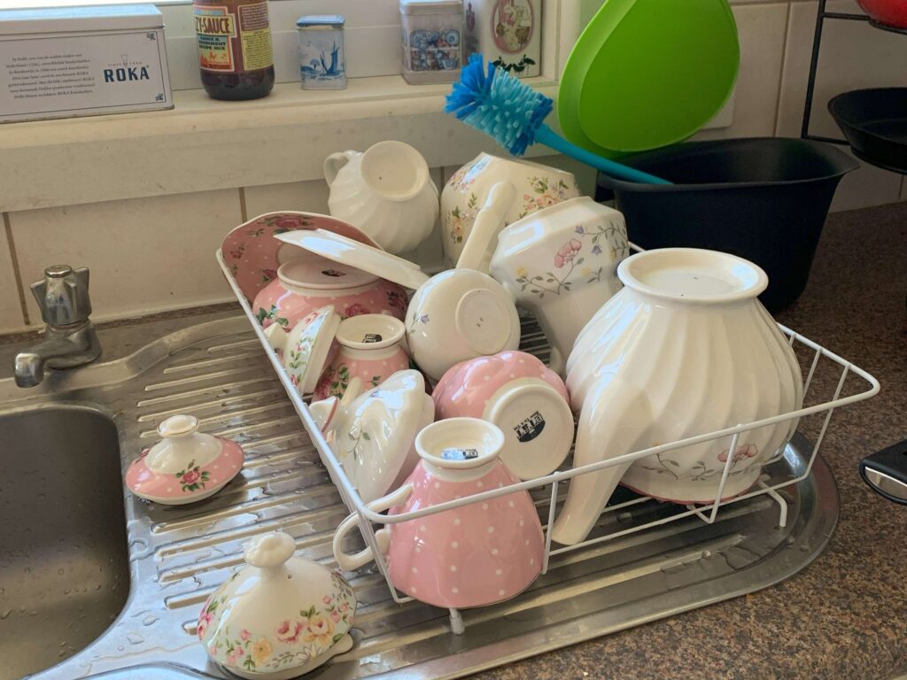 cleaning dishes before they go back into the cupboard